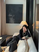 迎春100羊毛製のアシンメトリックニットベスト【バックタイデザイン】