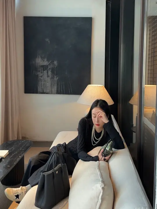 迎春100羊毛製のアシンメトリックニットベスト【バックタイデザイン】