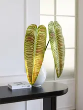 ハイエンドの模擬植物は、火の鶴の王様の葉の緑の植物に感じられます