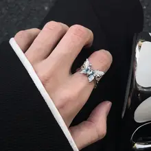 ブルークリスタルとホワイトムーンライトのバタフライリング【ユニセックス・デザイン・調整可能】