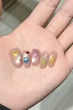 可愛らしいカートゥーンデザインの猫眼ネイルチップ【短め・手作り・レインボーシュガーカラー】