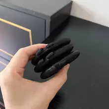 ダブルリボン付き黒革製パフ【極上の柔らかさ・粉体用・大きめサイズ】