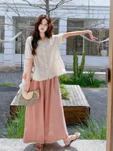 温かみのあるフラワー柄の短袖ブラウスとワイドパンツのセットアップ対応【夏用・スタイル】