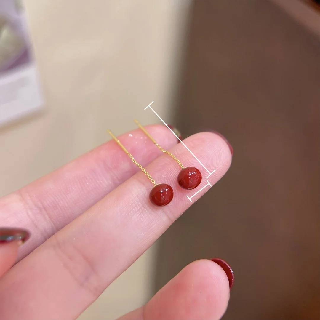 カーブピアスとは何か：赤色ビンテージパールフリンジイヤリングの実際の特徴と使い方
