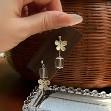 シンプルで洗練されたバタフライデザインの天然白水晶イヤリング【925シルバーピアス・ノー打孔対応・普段使いに最適】