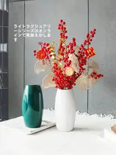 新年を祝い飾る！赤い发财果と冬青の造花アレンジ【テーブルデコレーション用・手作り装飾】