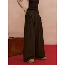 高密度ウール生地のプリーツリボンパンツ