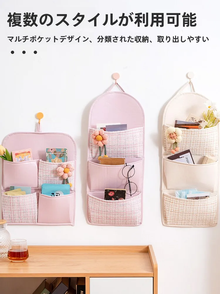 おしゃれな布製収納袋：透明ケースとは異なる、北欧風の壁掛け収納の実用性