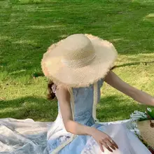 レースストラップ付きラフィア素材のつば広ハット【ビーチリゾート・夏用・丸型・フリンジデザイン】
