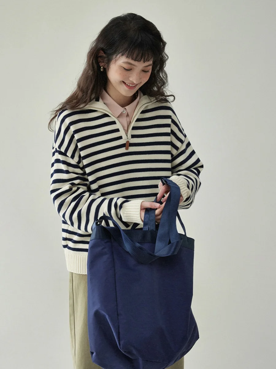 大人可愛い服 40代コーデの完全ガイド｜黒と白ストライプニットの心の安定感