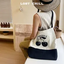 Lost Chill リュック【大容量・キャンバス・チェリーデザイン・斜め掛け】