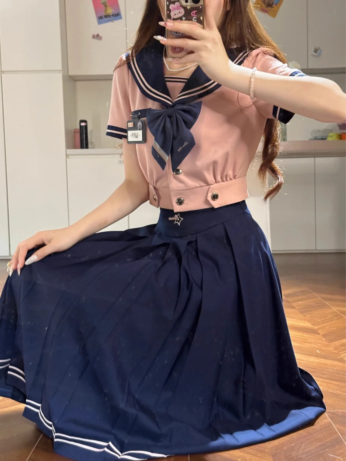 夏の桜柄ピンク学院風水手服：着崩し防止のための軽量棉素材と実用性の検証
