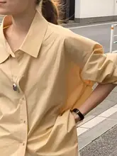 春のトレンド！明るい黄色のゆったり長袖シャツ【韓国風・ミニマルデザイン・カジュアルコーデ】
