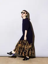 デザイン性のあるフィッシュテールTシャツワンピース【フリル付き・ルーズフィット・不規則なデザイン】