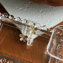 シンプルで洗練されたバタフライデザインの天然白水晶イヤリング【925シルバーピアス・ノー打孔対応・普段使いに最適】