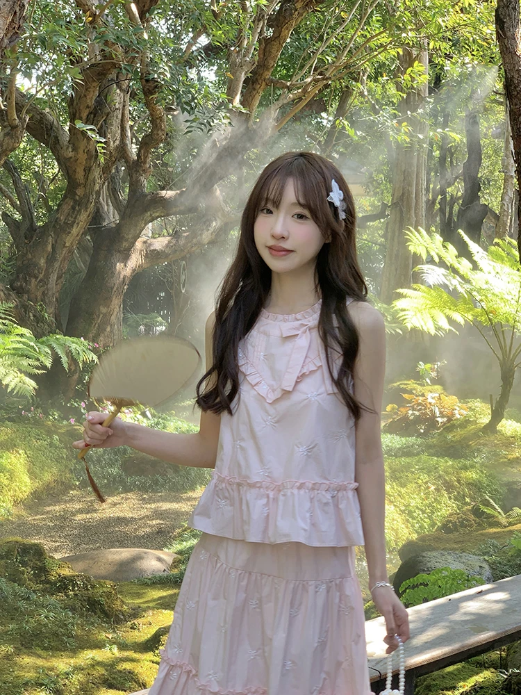 オリジナルデザインのJK制服【夏用・ノースリーブ・背中開き・モネの庭風】は明るい服としての実用性とファッション性をどう評価するか？