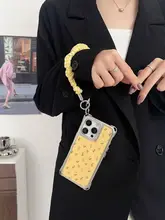 柔らかなイエローの花柄iPhone用ケース【ストラップ付き・斜め掛け対応・レザー製・四隅開孔】