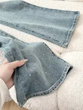 高腰のデザインが魅力！薄色ダメージデニムのフレアパンツ【夏用・煌めくストーン付き】