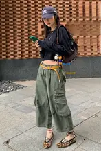 感漂う黒のトップスとワイドパンツのカジュアルコーデ（セットアップ対応）