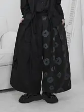 グレー調の花柄ワイドレッグスカートパンツ【落ち感・カジュアルスタイル・シルエット補正】（セットアップ対応）