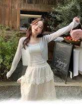 ブルーのニットカーディガン【キャミソール付き・独特なデザイン・女性用】（セットアップ対応）