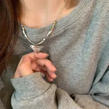 トライアングルデザインのニットネックレス【レディス・秋冬・ストリートスタイル】