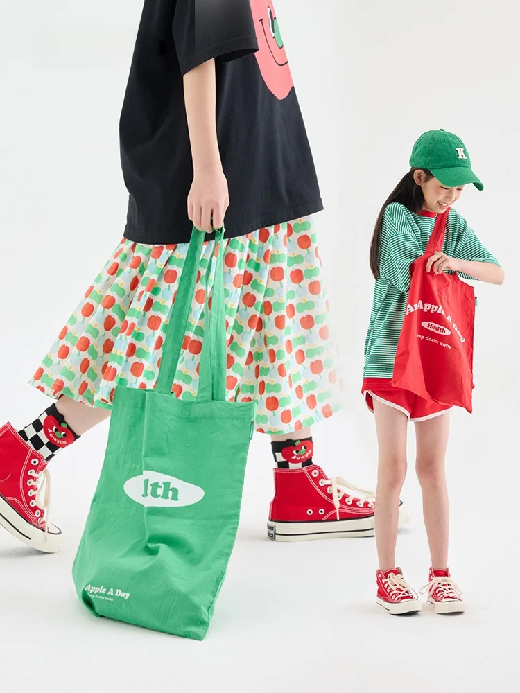 大きなリンゴデザインのキャンバスバッグ：kidboxとは何かか、その仕組みと安全性を解説