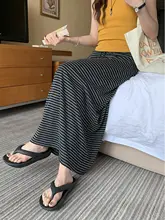 ストライプデザインのロングスカート【カジュアル・リボン付き・フレアシルエット・ボディラインを美しく見せる】