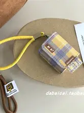チェック柄の笑顔デザインAirPods用ケース【プロ保護カバー・ぶら下げストラップ付き】