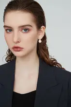 999純銀製 大きな真珠のイヤリング【気品漂うデザイン・イヤスタッド・軽やかな印象】