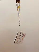スマホケース【折りたたみ式・かわいいカートゥーンデザイン・リボン付き・手提げタイプ】