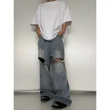 穴の開いたデニムパンツ バギー ストリート感 ウォッシュブルー 破壊加工
