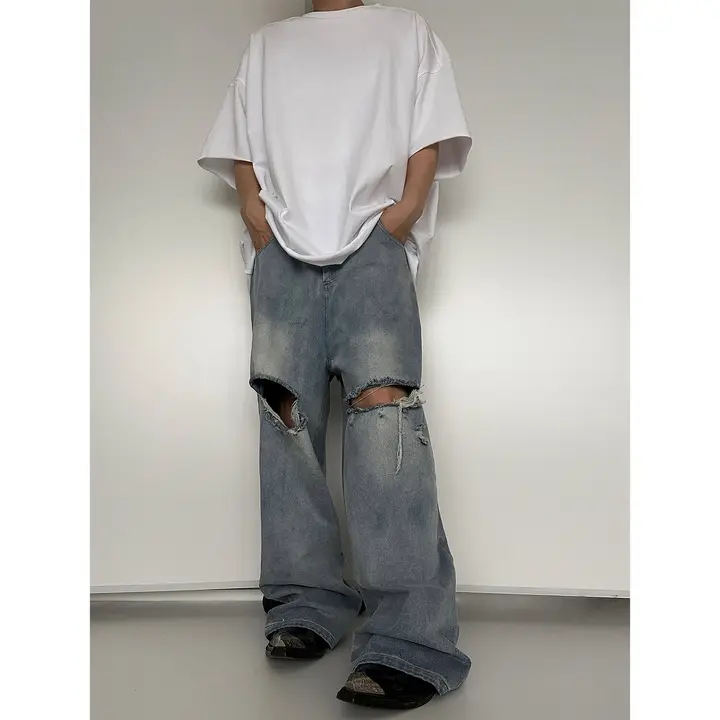 穴の開いたデニムパンツ バギー ストリート感 ウォッシュブルー 破壊加工