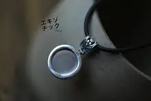 天然星光芙蓉石の925純銀製ペンダント【復古彫刻デザイン・華やかな輝き】