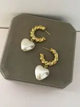 ハート型パールイヤリング【フレンチスタイル・レトロデザイン・メタルテクスチャ・優雅な雰囲気】
（セットアップ対応）