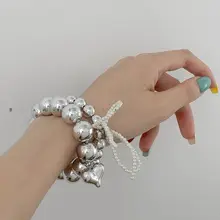 FUNCOCO シルバー パール ヘアゴム  ＆ブレスレット【リボンデザイン・韓国風】