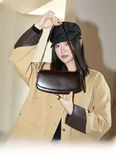 真皮製の鞍型バッグ【通勤用・傾斜掛け・シンプルデザイン】