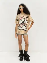 小犬のアートプリントが魅力！ゆったりデザインの女性用Tシャツ【短袖・グラデーション仕様】