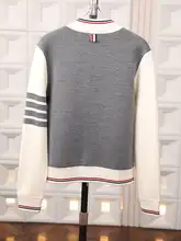 暖かく体型をカバーする100%ウール配色ニットカーディガン