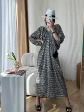 個性的なデザイン！Vネックバックオープンランタンスリーブロングドレス【した雰囲気・フラワープリント】