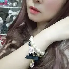 可愛い二重リボンデザインのパールビーズブレスレット【水晶装飾・女の子向け】