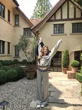 グレーのチェック柄パンツ【フィット・秋冬用・ワイドレッグ・カジュアル】（セットアップ対応）