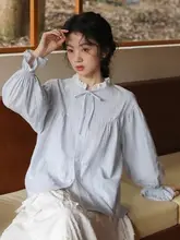 春にぴったり！ストライプデザインのリボン付きシャツ【甘くてゆったり・フリルエッジ】