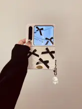 白色毛绒立体リボン付きスマートフォンケース【スタイリッシュ・秋冬用・チャーム付き】