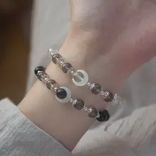 月の光と影を感じるオニキスとホワイトクリスタルのカップル用ブレスレット【シンプルデザイン・マザーオブパール使用】