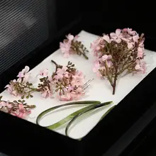 優雅な花飾りのウェディングヘッドアクセサリー【ピンク・精緻な造花・伝統的なデザイン】