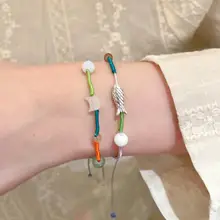 カラフルなビーズが魅力の編み込みブレスレット【可愛らしいデザイン・エスニックスタイル・多色使い】（セットアップ対応）