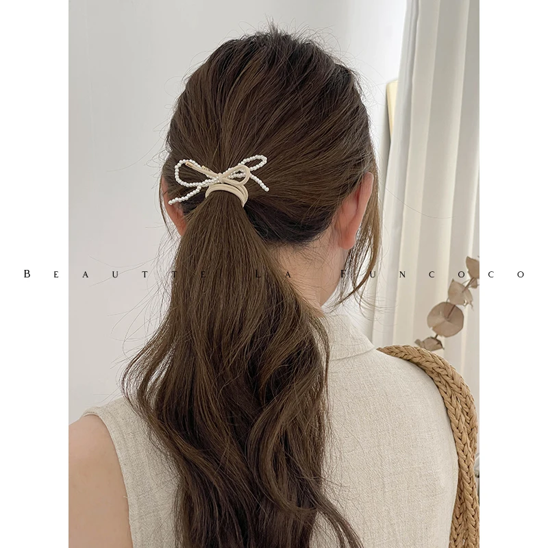かぎ針で編むリボン小物の実用性：パールリボン付き高弾性ヘアゴムの使い方と性能解析