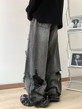 ストリートスタイルデザインのアシンメトリー破れデニムパンツ【ゆったりシルエット・夏用・ウォッシュ加工】