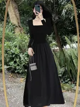 シンプルなデザインの黒いロングドレス【長袖・ウエスト絞り・ラウンドネック・大人の雰囲気】